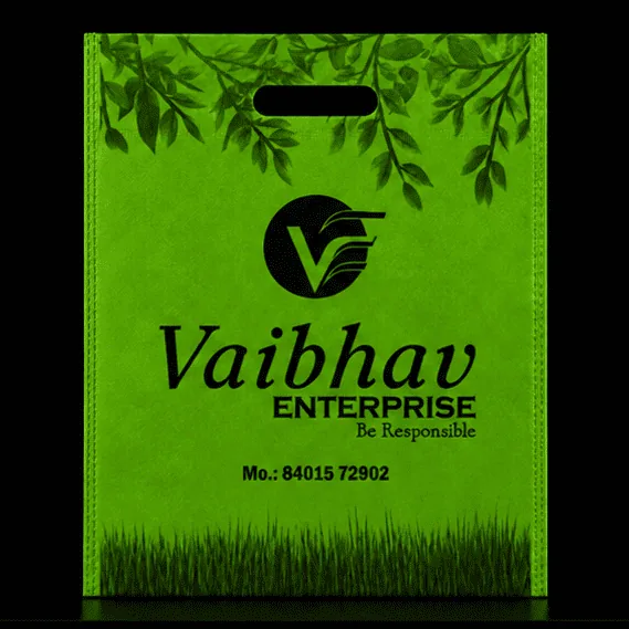 Green D-Cut non-woven carry bag with custom logo printing by Vaibhav Enterprise
