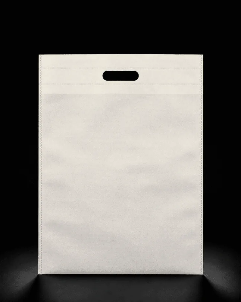 White D-Cut non-woven carry bag with custom logo printing by Vaibhav Enterprise