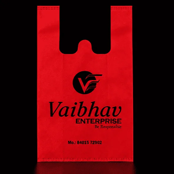 Red W-Cut non-woven carry bag with custom logo printing by Vaibhav Enterprise