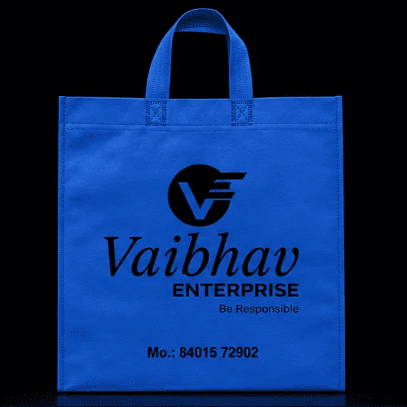 Blue Loop Handle non-woven carry bag with custom logo printing by Vaibhav Enterprise