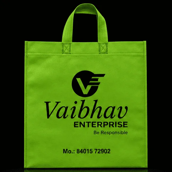 Green Loop Handle non-woven carry bag with custom logo printing by Vaibhav Enterprise