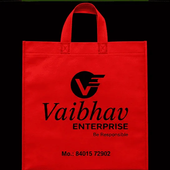 Red Loop Handle non-woven carry bag with custom logo printing by Vaibhav Enterprise