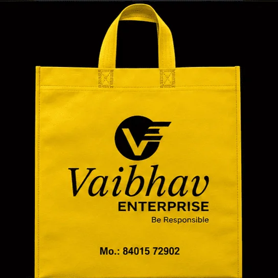 Yellow Loop Handle non-woven carry bag with custom logo printing by Vaibhav Enterprise