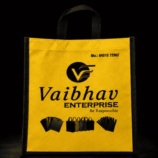 Yellow Stitched non-woven carry bag with custom logo printing by Vaibhav Enterprise