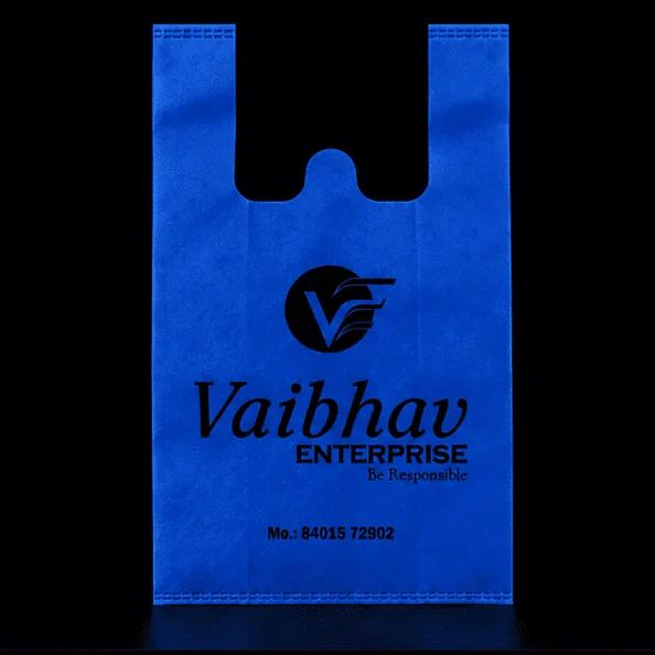 Blue W-Cut non-woven carry bag with custom logo printing by Vaibhav Enterprise